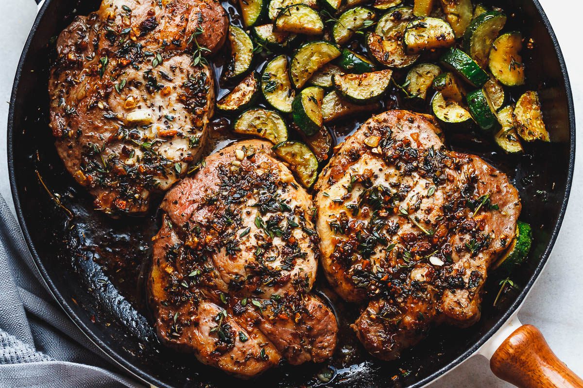 Garlic Butter Herb Pork Chops with Zucchini — Eatwell101