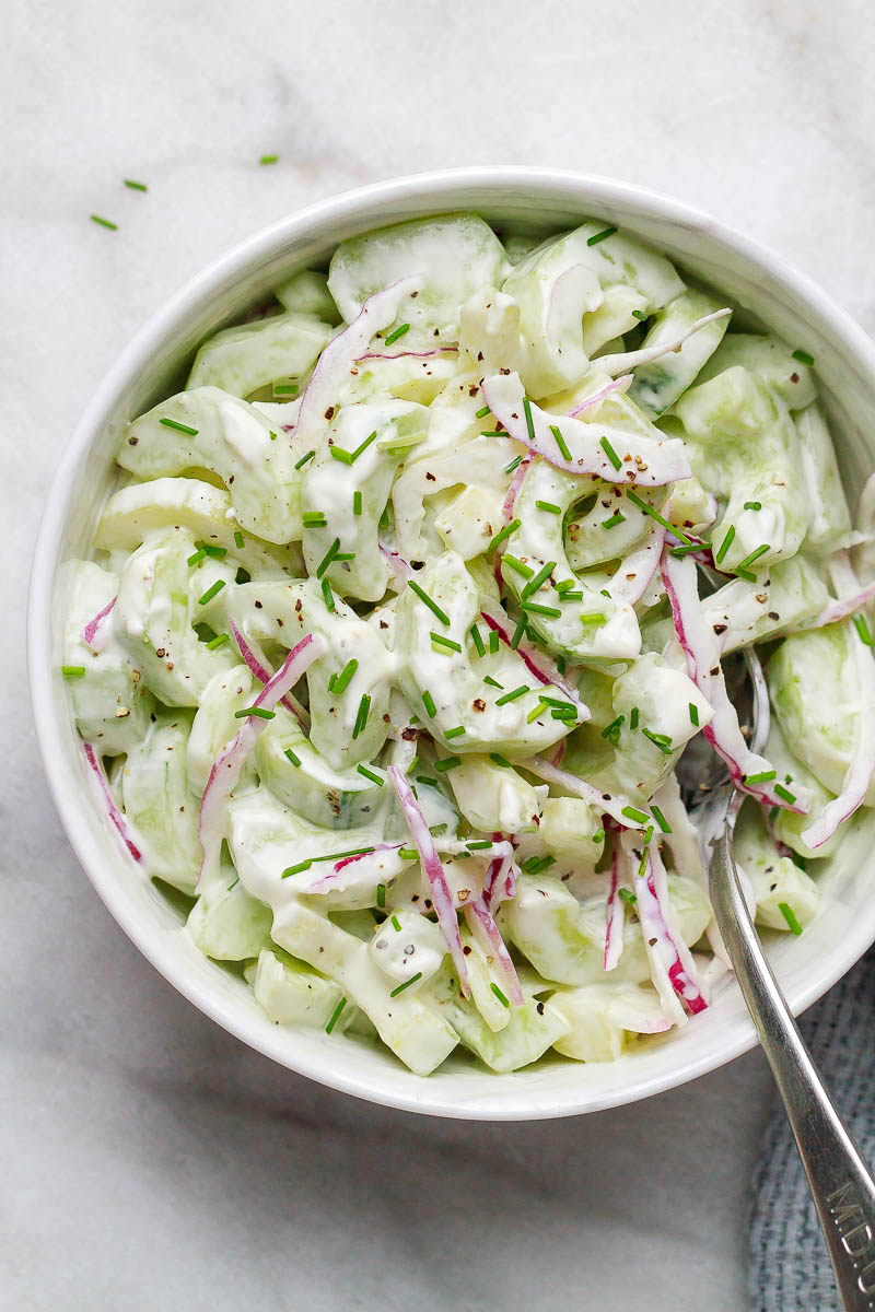 Creamy Cucumber Salad - A delicious, refreshing salad you can serve as a great side for your grilling cookouts or on its own for a light dinner.