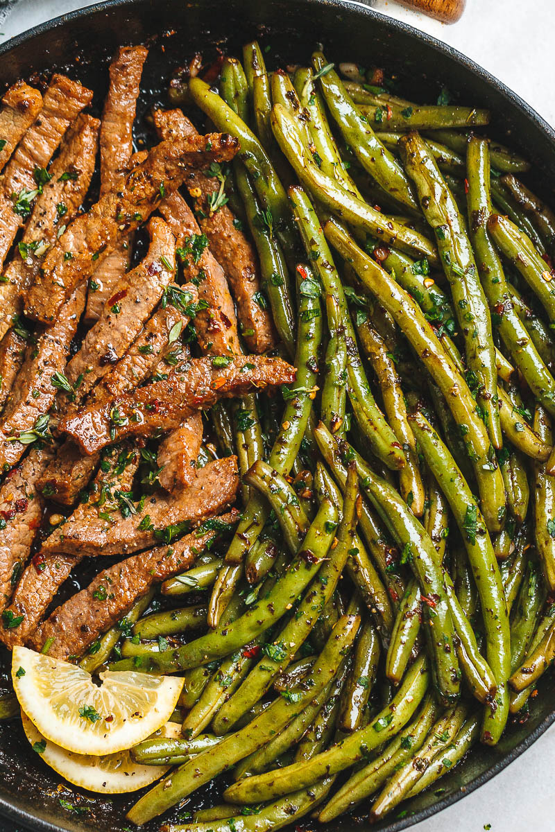 Garlic Butter Steak and Lemon Green Beans Skillet - So addicting! The flavor combination of this quick and easy one pan dinner is spot on!