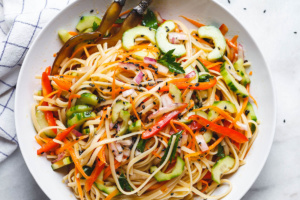 Asian Noodle Salad - With the Best Ever Ginger Vinaigrette. This vegan make-ahead salad is loaded up with healthy veggies and perfect for midweek lunches or larger gatherings.