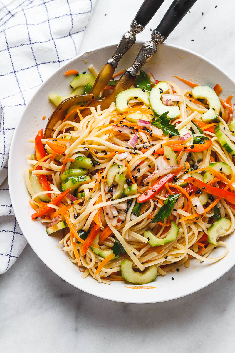 Asian Noodle Salad - With the Best Ever Ginger Vinaigrette. This vegan make-ahead salad is loaded up with healthy veggies and perfect for midweek lunches or larger gatherings.