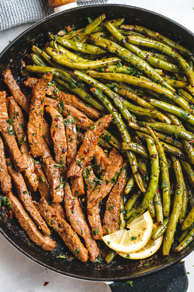 Garlic Butter Steak and Lemon Green Beans Skillet - So addicting! The flavor combination of this quick and easy one pan dinner is spot on!