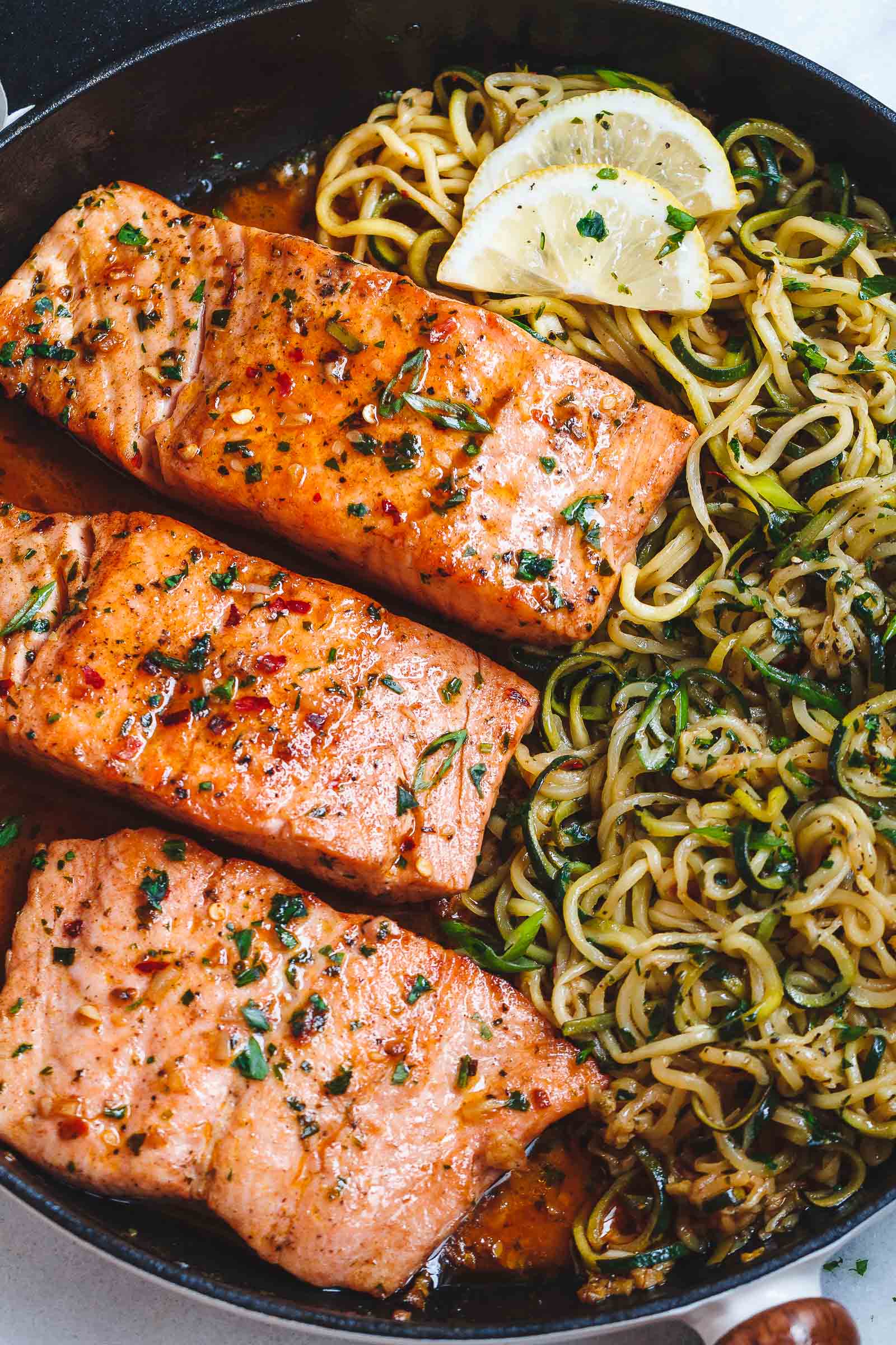 Lemon Garlic Butter Salmon with Zucchini Noodles - #eatwell101 #recipe #salmon #keto #paleo #lowcarb - Light, low carbs and ready in 20 minutes. Dinner perfection for any weeknight!
