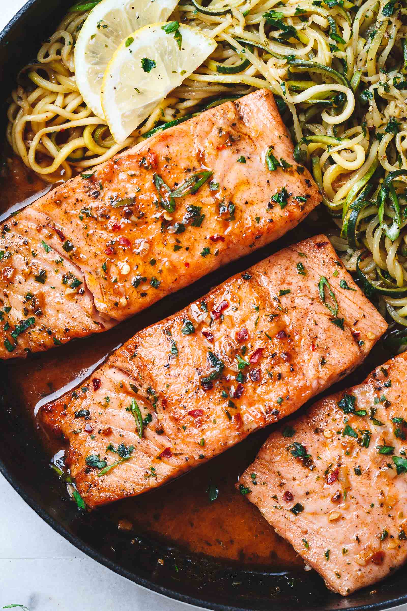 Lemon Garlic Butter Salmon with Zucchini Noodles - #eatwell101 #recipe #salmon #keto #paleo #lowcarb - Light, low carbs and ready in 20 minutes. Dinner perfection for any weeknight!