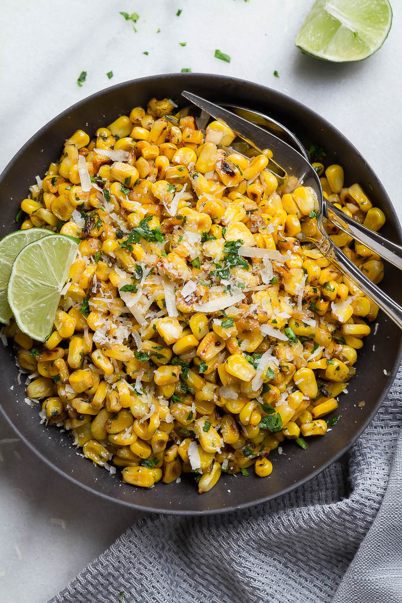 Grilled Corn with Garlic and Parmesan Cheese - Enjoy the addictive flavor of grilled corn anytime you want with this spicy cheesy grilled corn  recipe. 