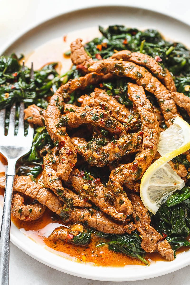 Lemon Garlic Butter Steak and Spinach - Tons of flavor and so easy to make! A quick low carb dinner you’ll be crazy about.