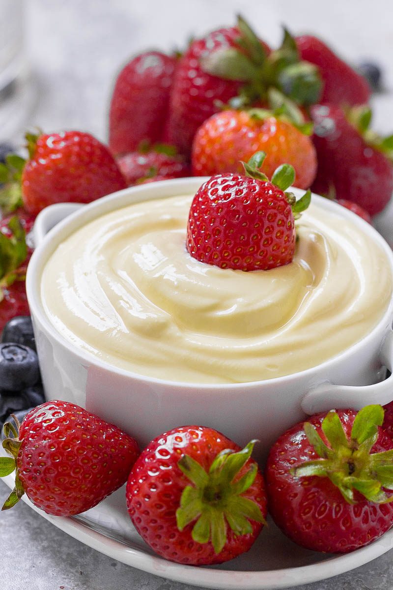 Cream Cheese Fruit Dip - Lightly sweet and super fluffy, this fruit dip is a great way to get everyone to eat more fruit this season! 