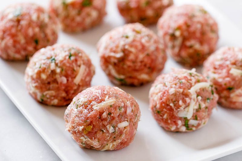 Cheesy Stuffed Turkey Meatballs with Cauliflower Rice - A rich and indulgent plate of comfort with a healthy twist!