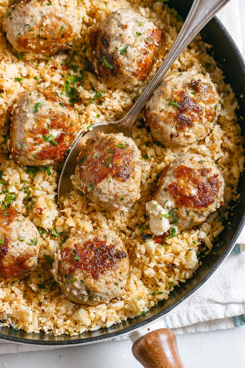 Cheesy Stuffed Turkey Meatballs with Cauliflower Rice - A rich and indulgent plate of comfort with a healthy twist!