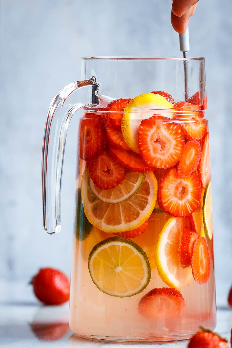 Strawberry Lime Punch - Refreshing and full of flavors, this citrusy strawberry punch is perfect for serving up at your parties this summer!