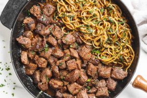 Garlic butter Steak Bites with Lemon Zucchini Noodles - So much flavor and so easy to throw together!