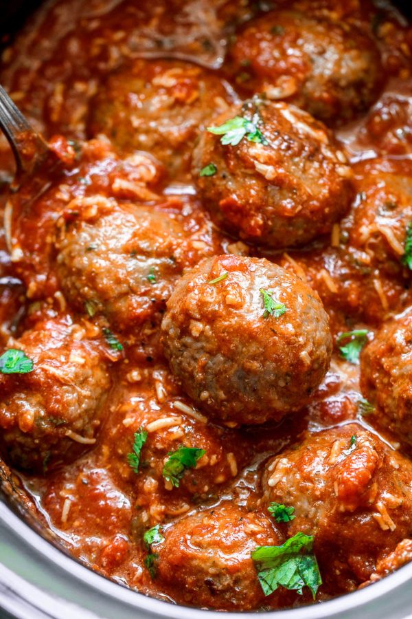 Slow Cooker Italian Sausage Meatballs in Tomato Parmesan Sauce - #recipe by #eatwell101 - https://www.eatwell101.com/slow-cooker-italian-sausage-meatballs-recipe
