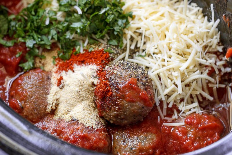 Slow Cooker Italian Sausage Meatballs - A dreamy and hearty, comfort-style slow cooker recipe that's too good NOT to be on rotation!