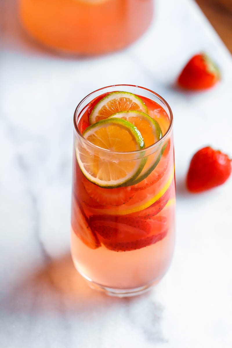 Strawberry Lime Punch - Refreshing and full of flavors, this citrusy strawberry punch is perfect for serving up at your parties this summer!