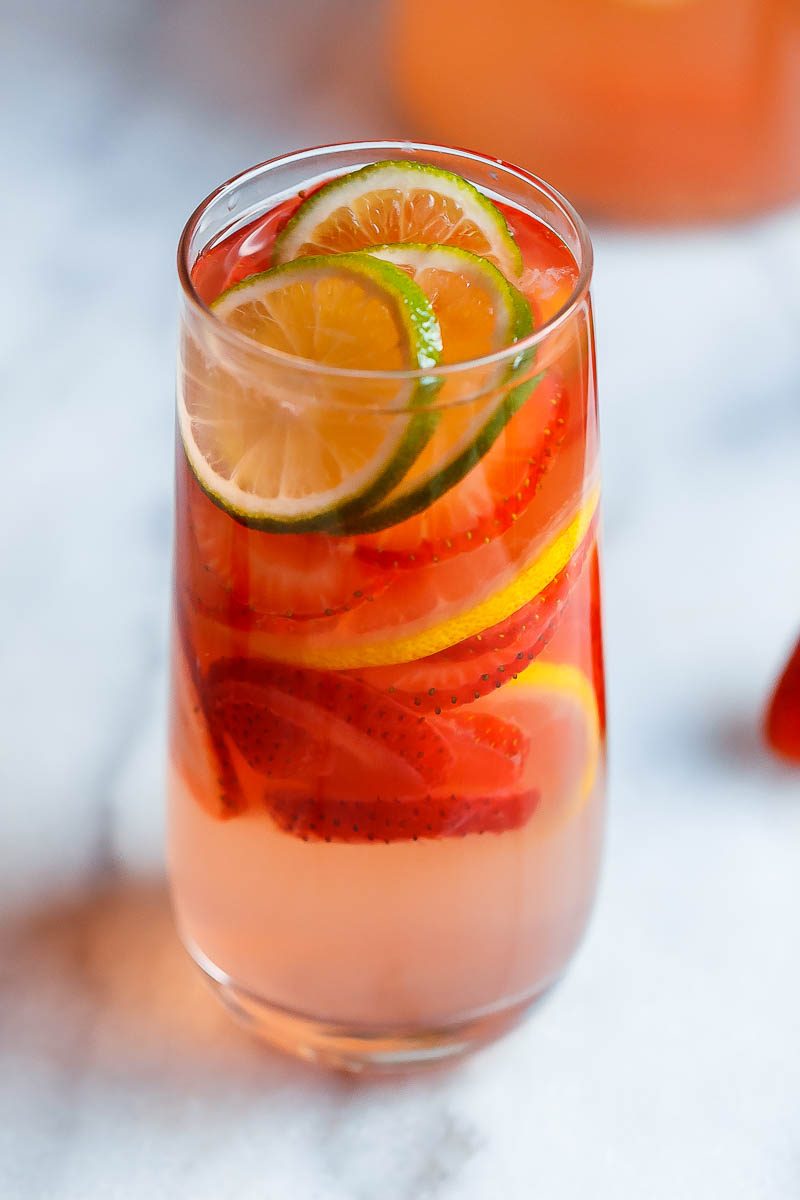 Strawberry Lime Punch - Refreshing and full of flavors, this citrusy strawberry punch is perfect for serving up at your parties this summer!