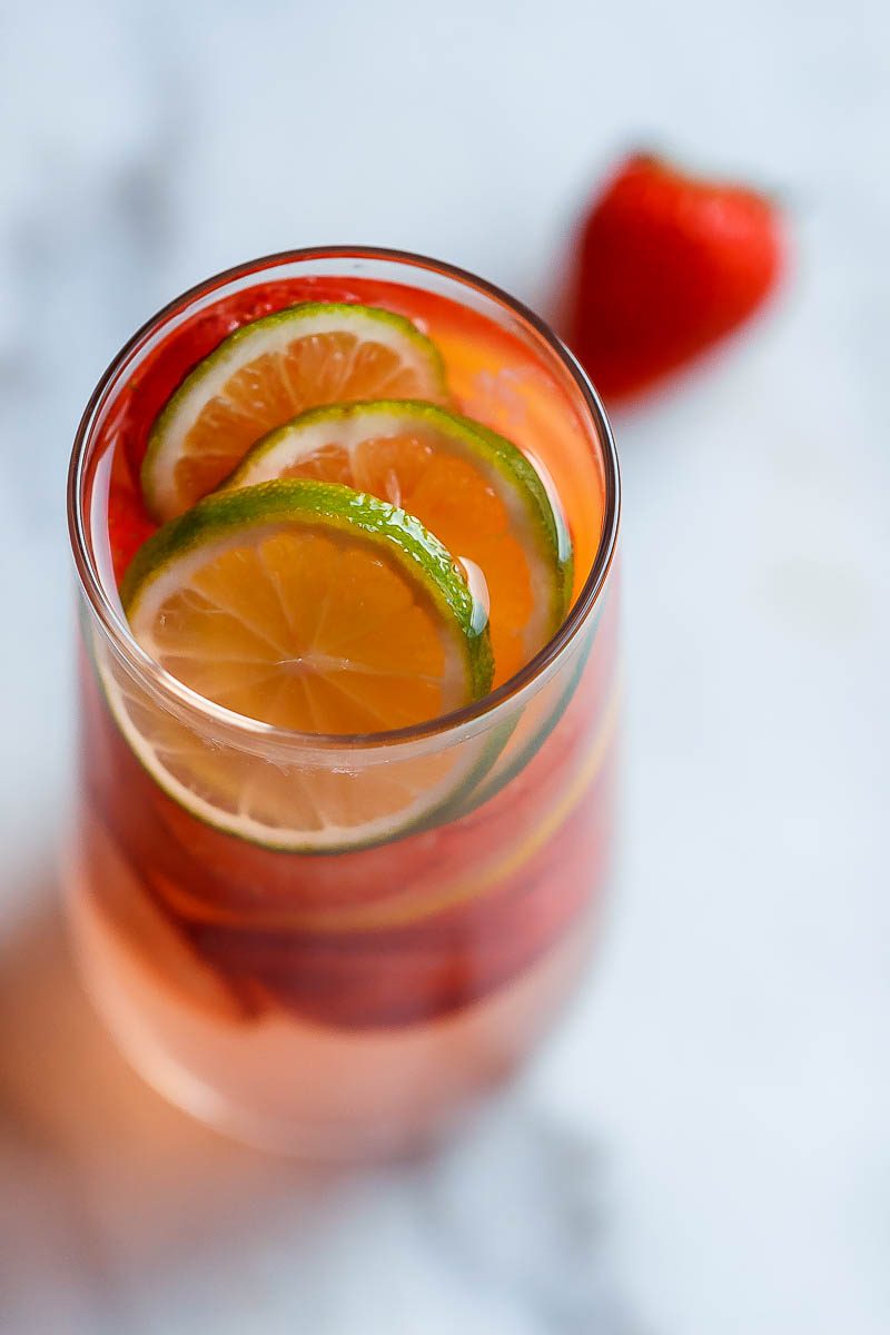 Strawberry Lime Punch - Refreshing and full of flavors, this citrusy strawberry punch is perfect for serving up at your parties this summer!