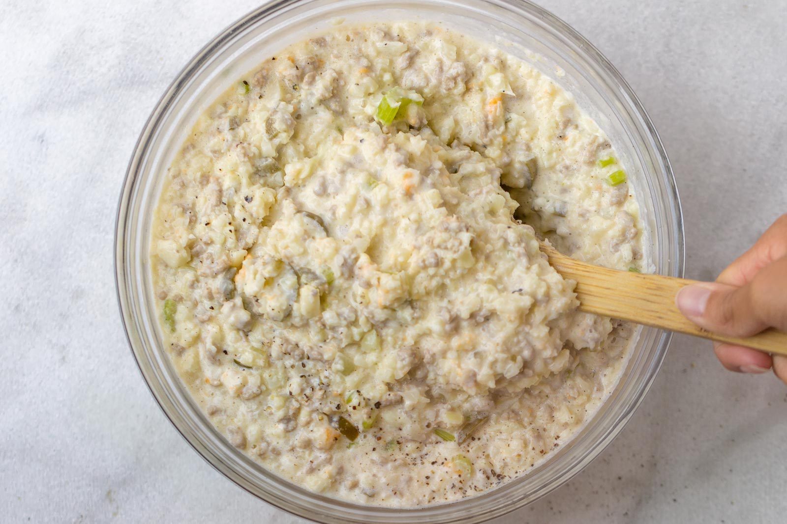 Green Chile Cauliflower Casserole - Warm and addicting comfort food alert! A quick, easy and great for your weekly meal rotation!