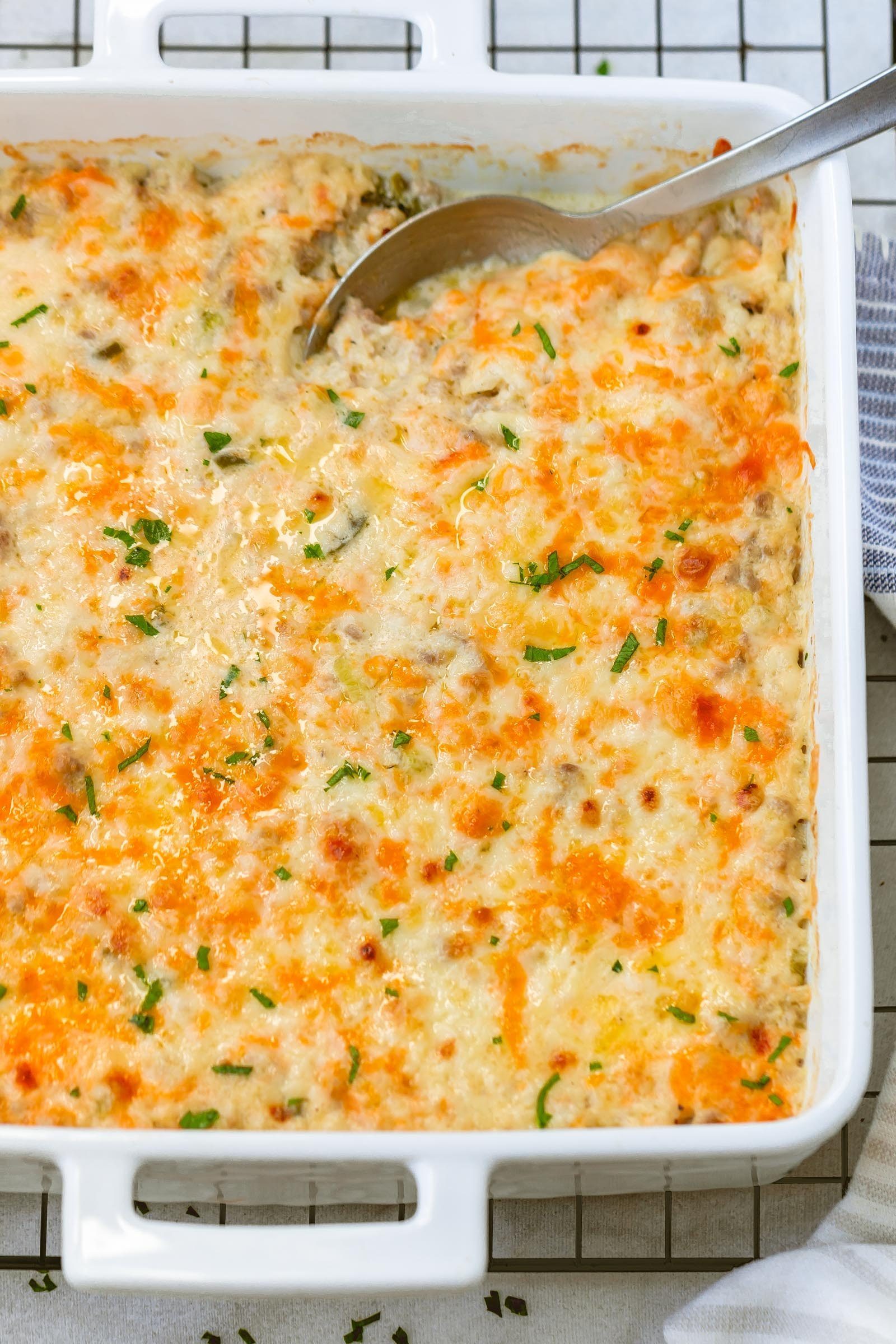 Green Chile Cauliflower Casserole - Warm and addicting comfort food alert! A quick, easy and great for your weekly meal rotation!