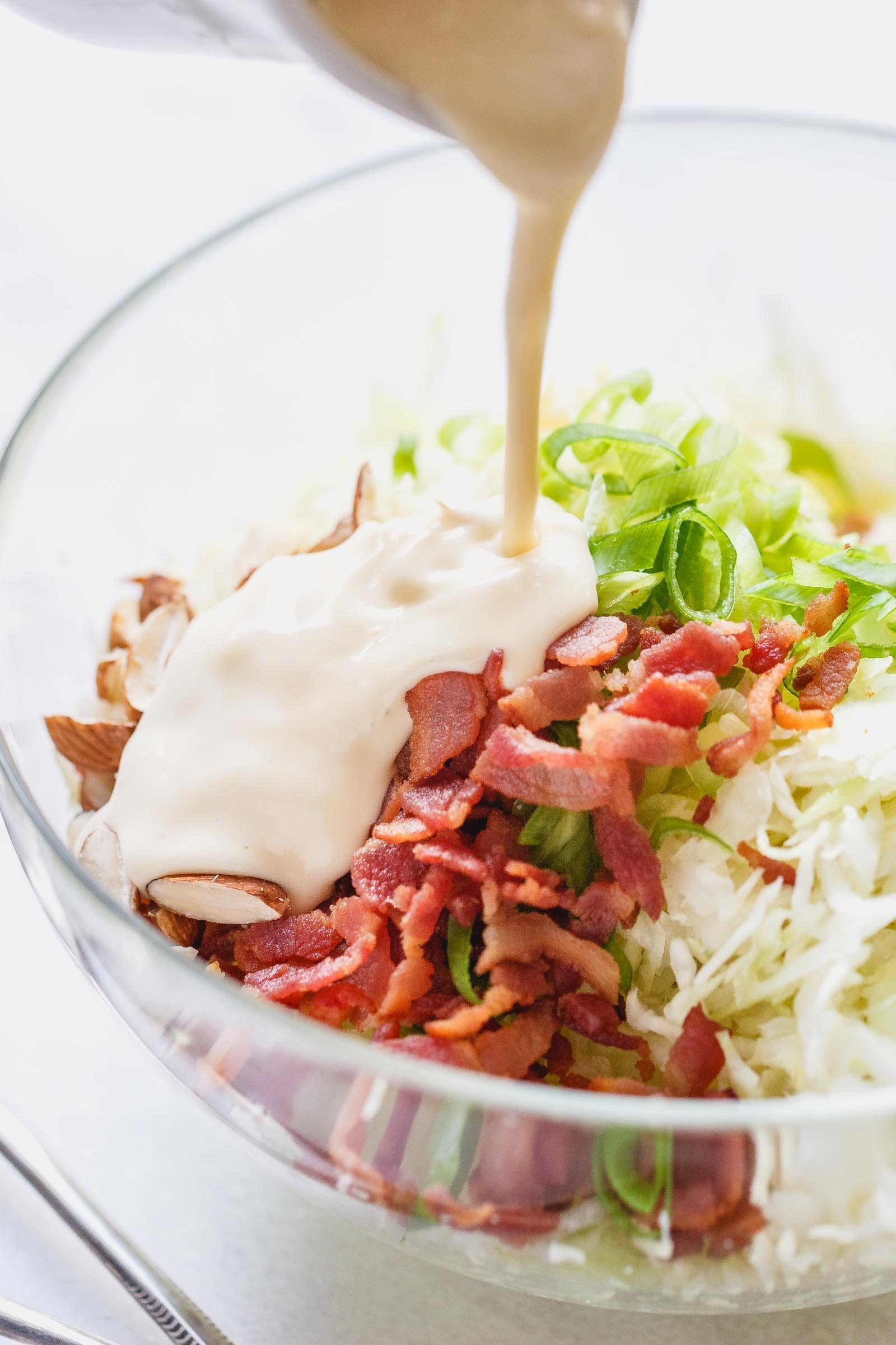 Apple Bacon Coleslaw - Super creamy, crunchy, and fresh! This coleslaw recipe only takes a few minutes to make and is packed with bright and delicious flavor!