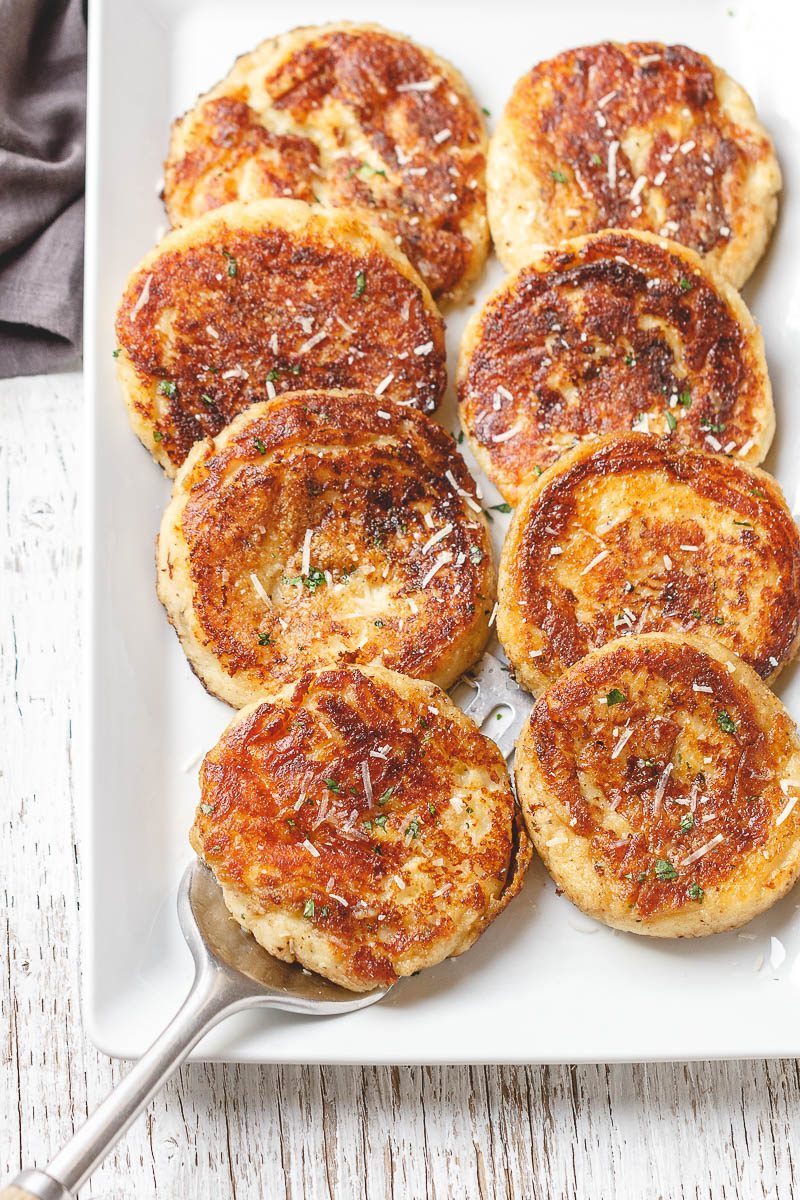 Mashed Potato Cakes - These mashed potato cakes with garlic and parmesan make a super easy side dish, light dinner or lunch!