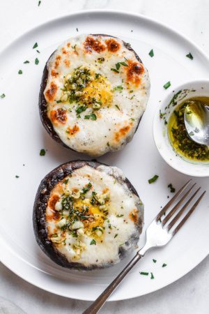 Cheesy Stuffed Portobello Mushrooms with Garlic Butter Sauce
