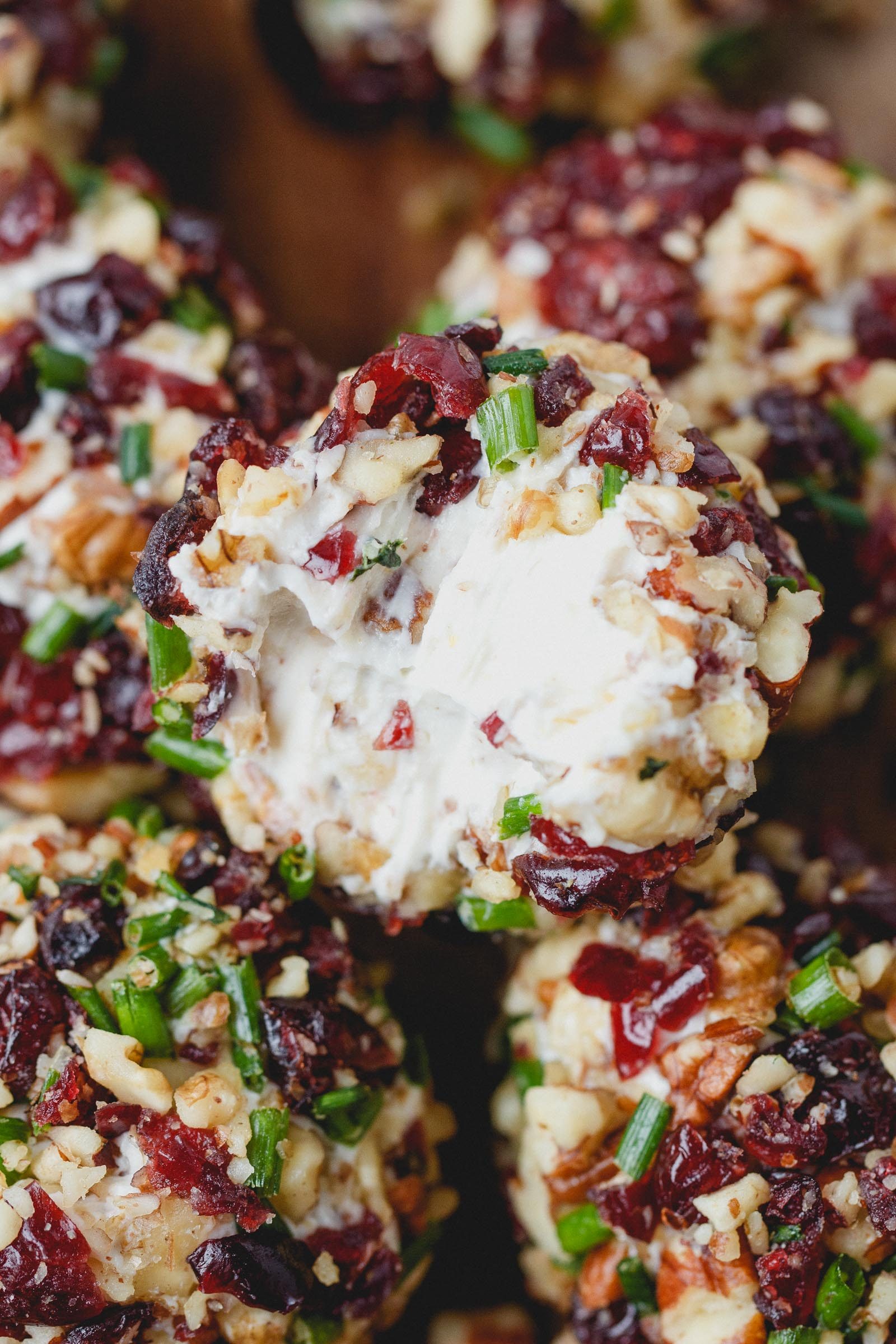 Cranberry Nut Cream Cheese Balls - These super festive cheese balls won't last long on your table - definitely a crowd pleaser!