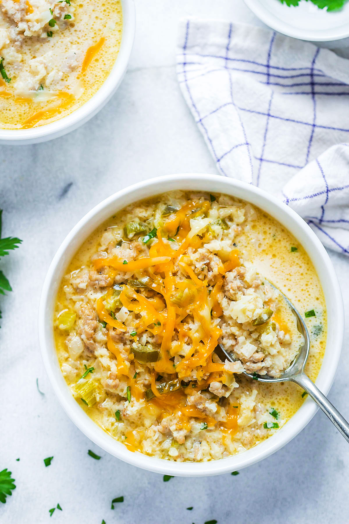 Creamy Cauliflower Rice Chicken Soup - A quick and easy meal that's perfect to warm you up. 