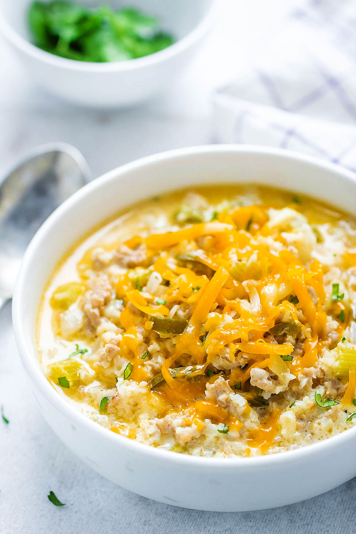 Creamy Cauliflower Rice Chicken Soup - A quick and easy meal that's perfect to warm you up.