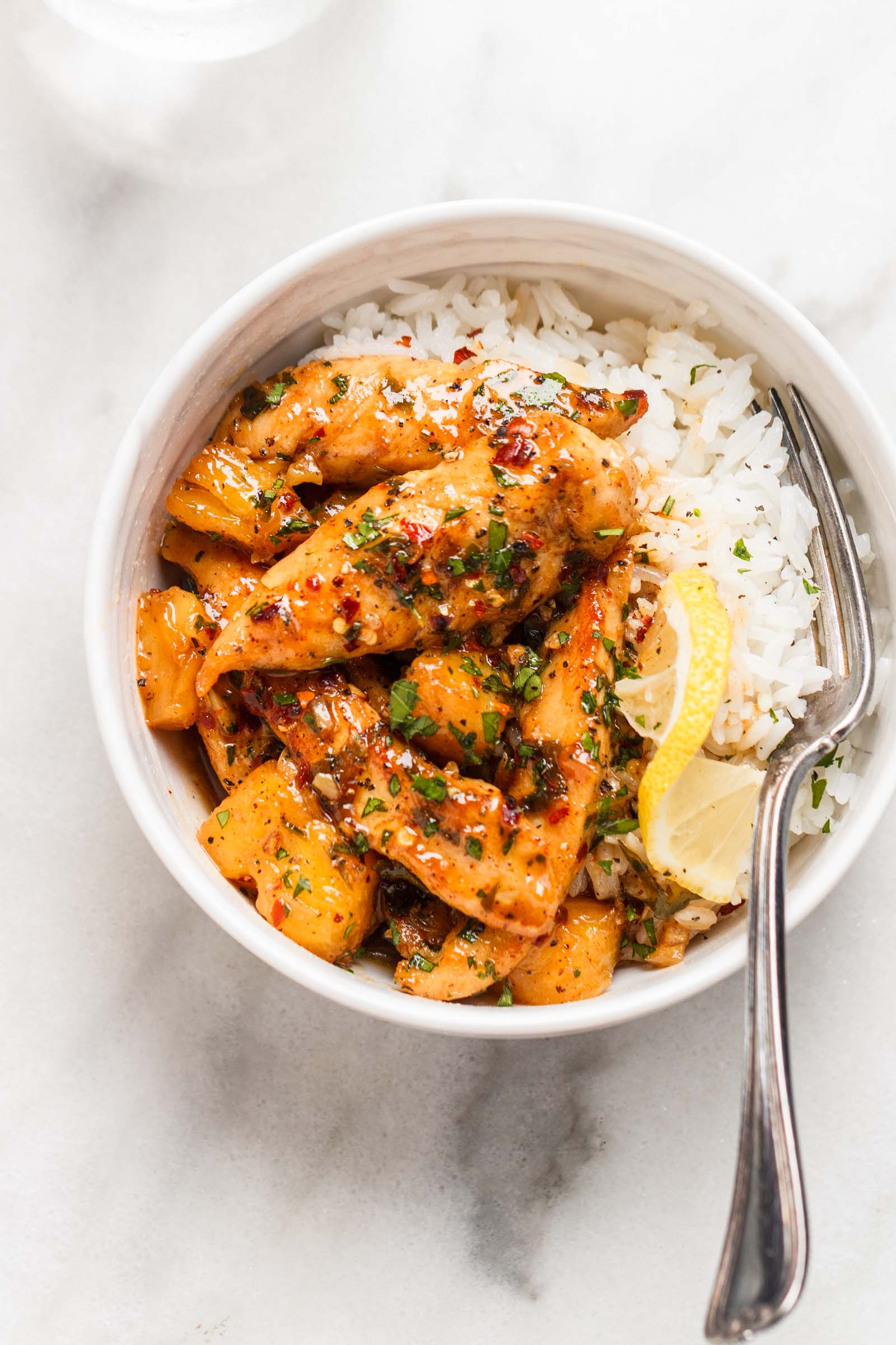 Garlic Butter Chicken Pineapple Skillet - This pineapple chicken is SO TENDER and JUICY bursting with savory sweet flavor!