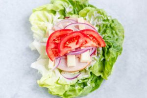 Lettuce Wrap Sandwich with Ham, Tomato and Mozzarella