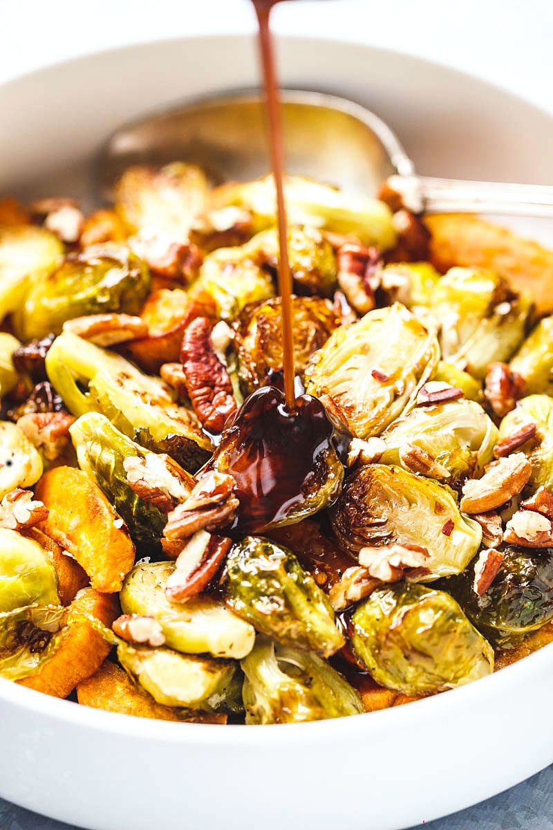Roasted Brussels Sprouts and Sweet Potato with Balsamic Honey Glaze – Wonderfully homey and comforting! This tasty side-dish is perfect for the holidays or any time this fall.