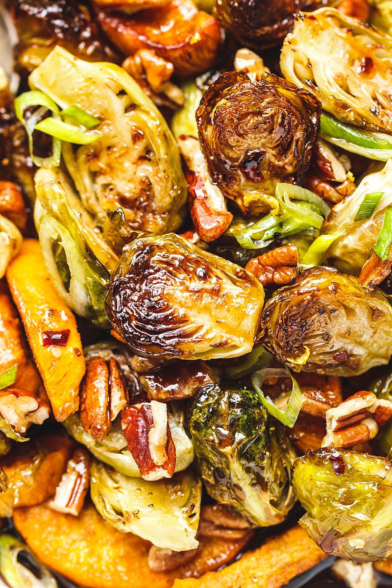 Roasted Brussels Sprouts and Sweet Potato with Balsamic Honey Glaze – Wonderfully homey and comforting! This tasty side-dish is perfect for the holidays or any time this fall.
