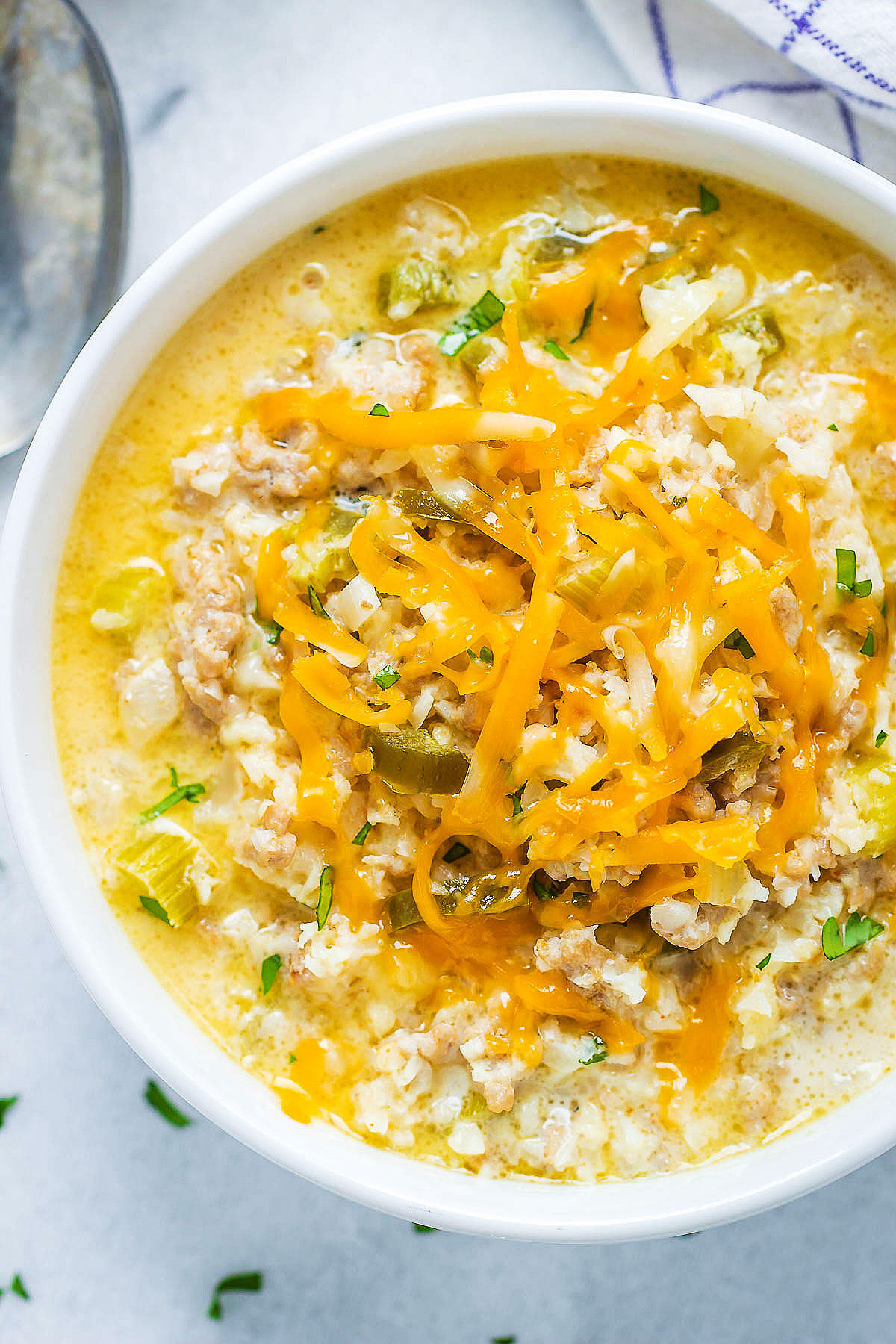 Creamy Cauliflower Rice Chicken Soup - A quick and easy meal that's perfect to warm you up.