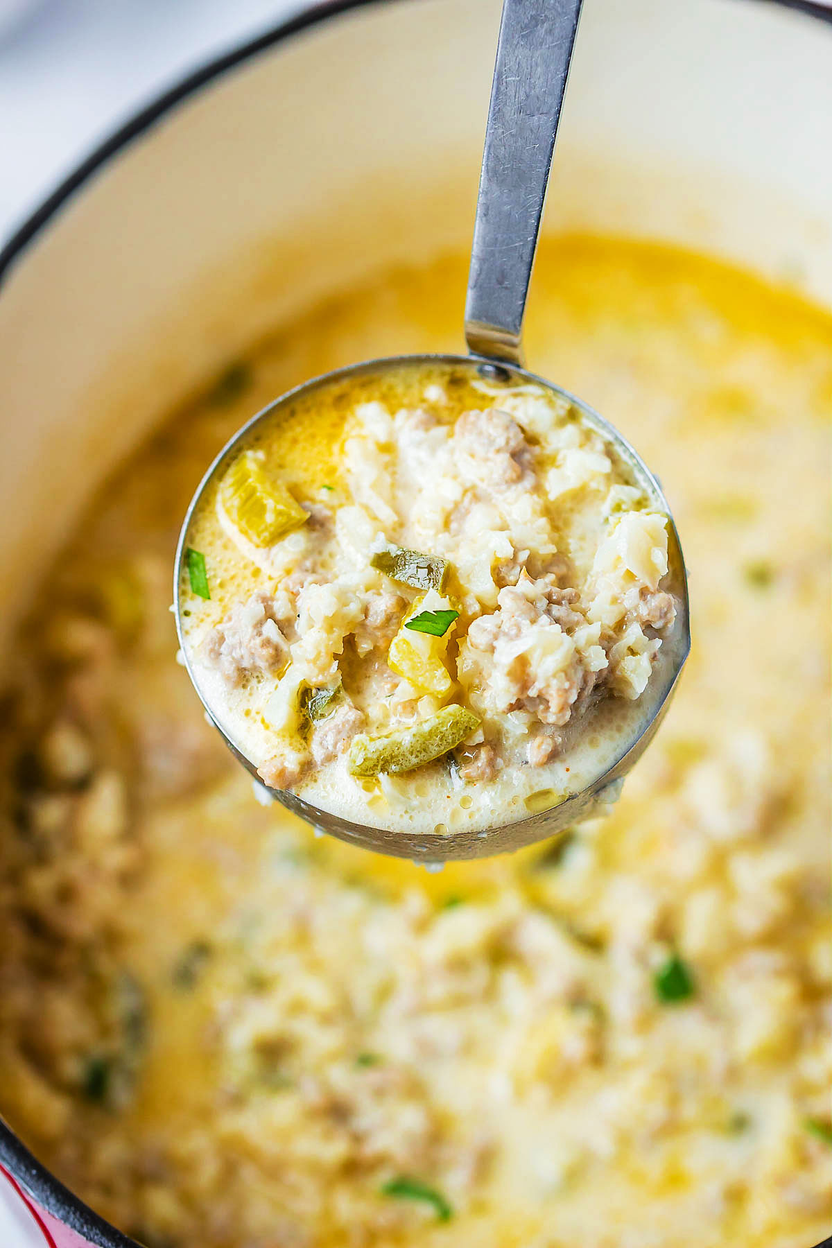 Creamy Cauliflower Rice Chicken Soup - A quick and easy meal that's perfect to warm you up.