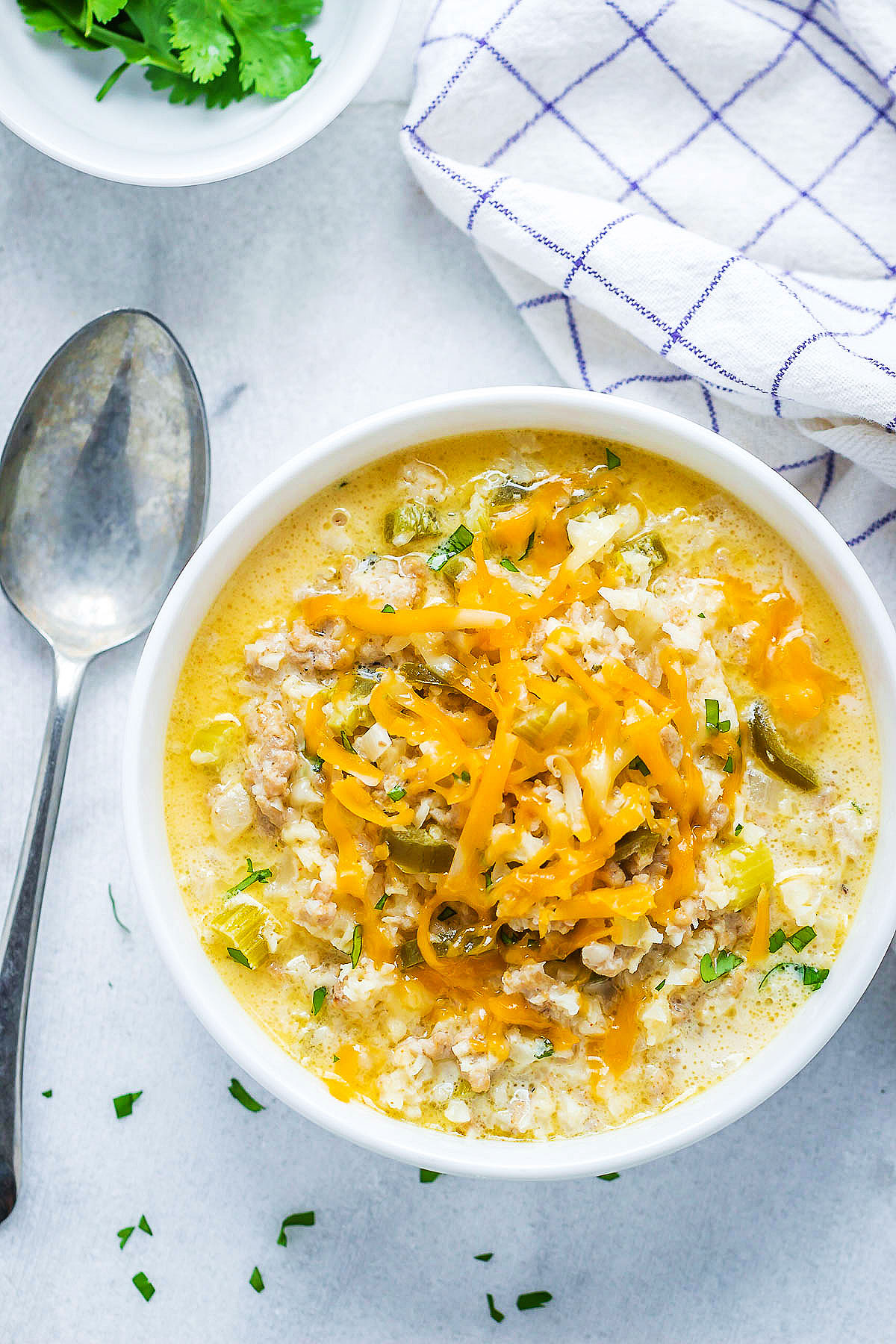 Creamy Cauliflower Rice Chicken Soup - A quick and easy meal that's perfect to warm you up.