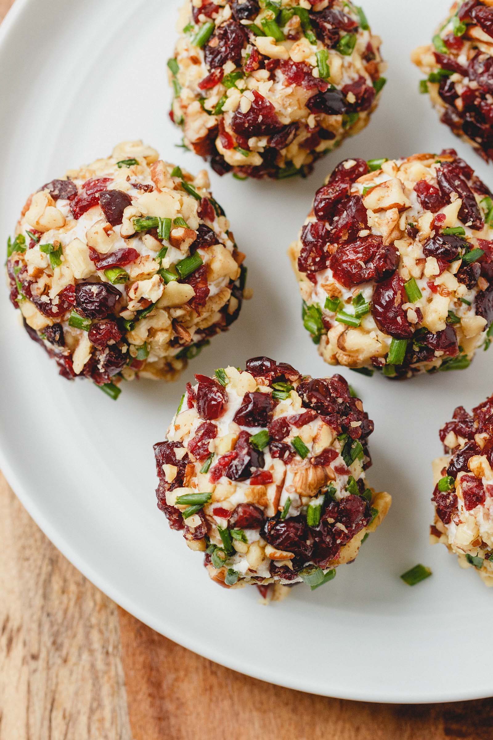 Cranberry Nut Cream Cheese Balls - These super festive cheese balls won't last long on your table - definitely a crowd pleaser! 