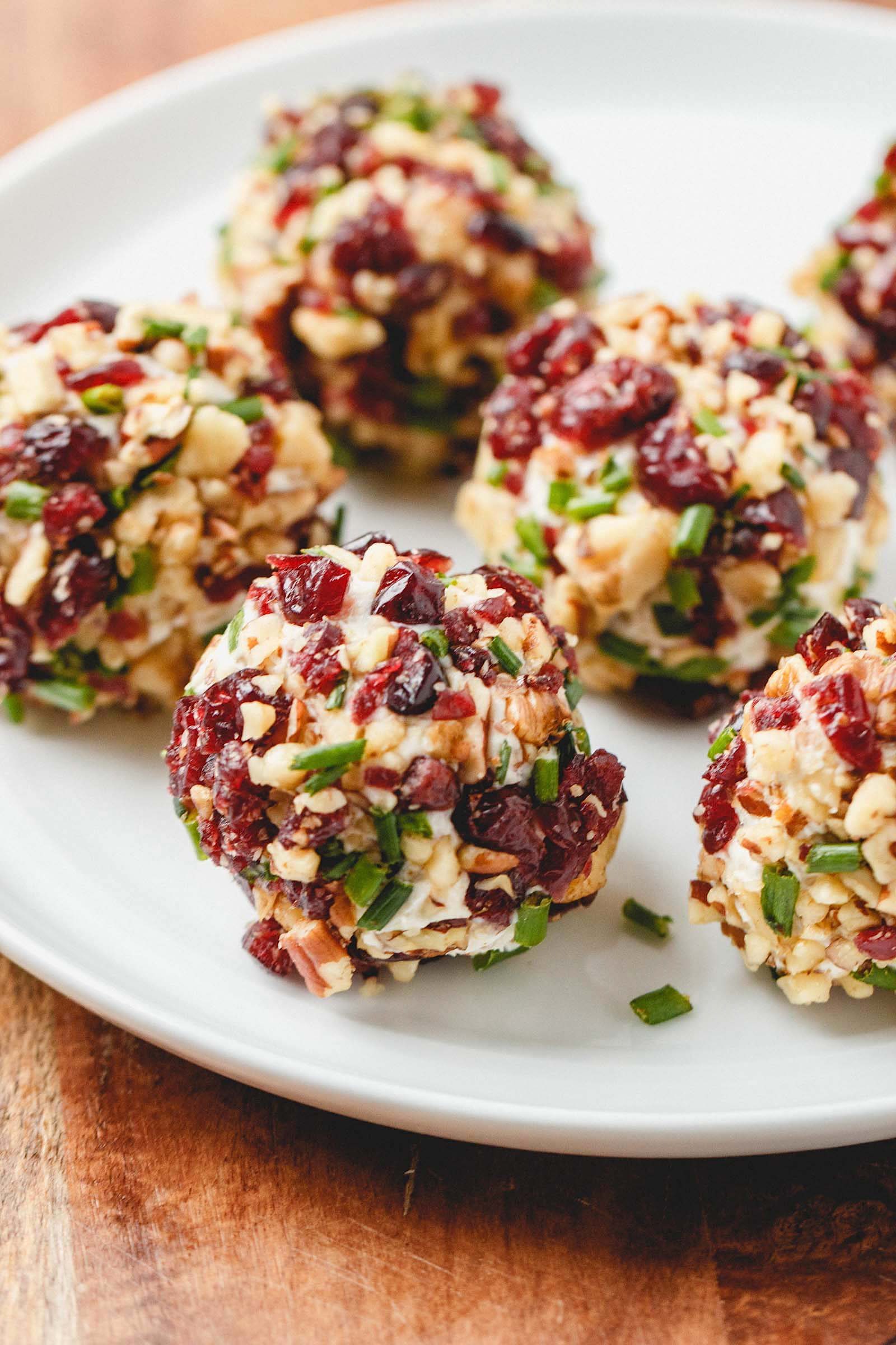 Cranberry Nut Cream Cheese Balls - These super festive cheese balls won't last long on your table - definitely a crowd pleaser!