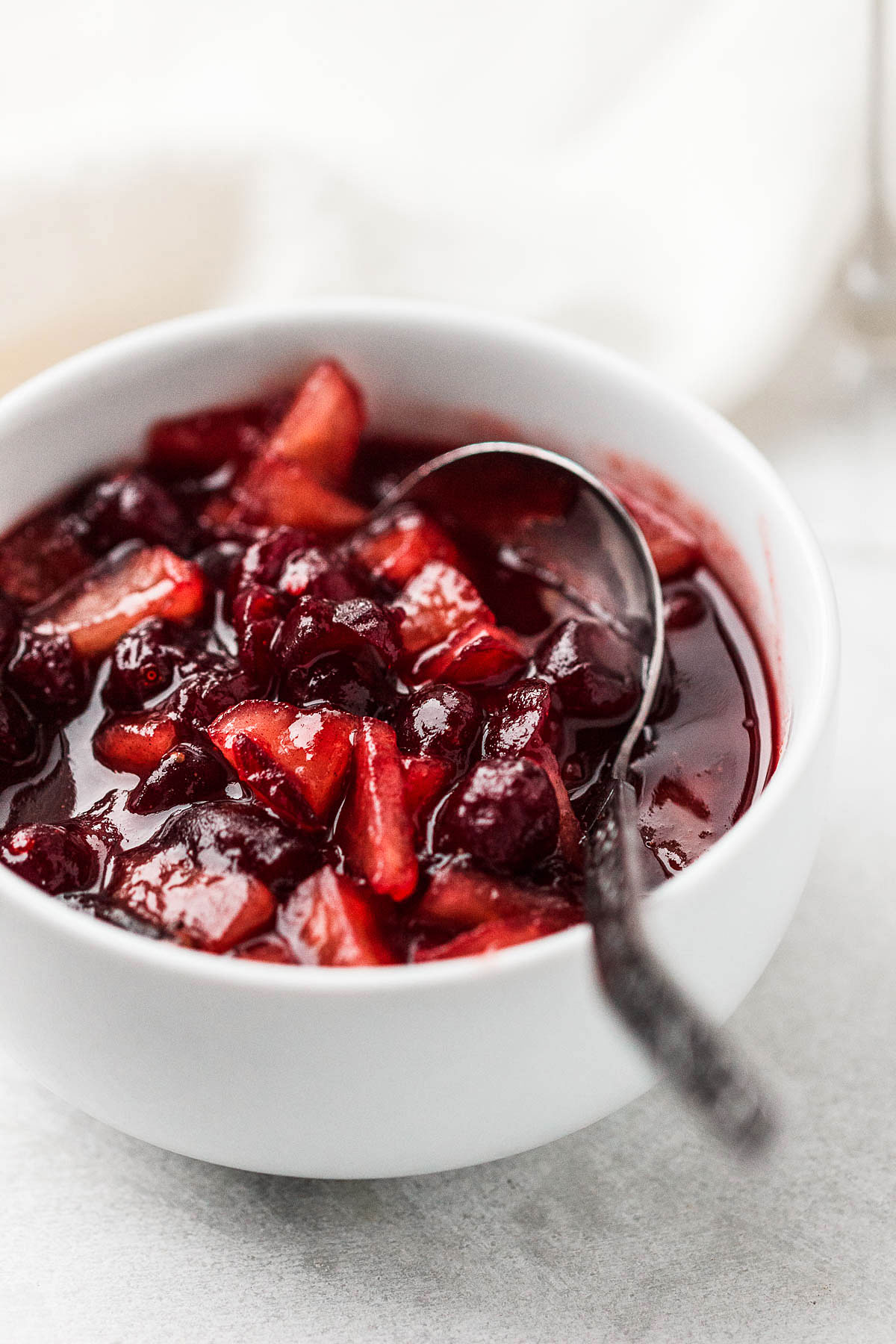 Apple Cranberry Sauce - Our delicious homemade cranberries sauce is simmered to perfection with cranberries, apples, maple syrup, and cinnamon.