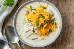 Slow Cooker Turkey Cream Cheese Soup - Rich and velvety, you'll enjoy every spoonful of this hearty turkey cream cheese soup!