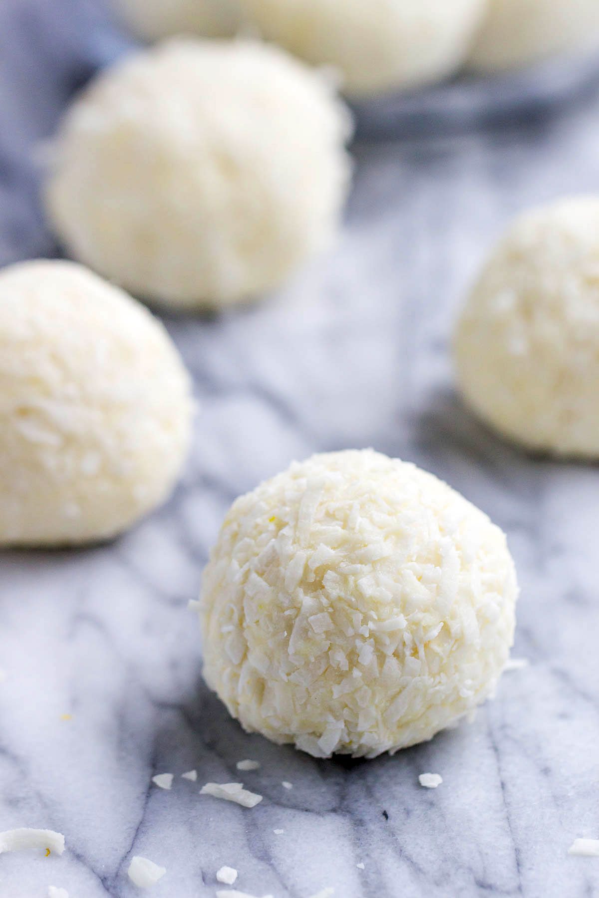 Lemon Cheesecake Keto Fat Bombs - These low-carb, keto fat-bombs are an easy, no-bake frozen treat you can make with simple ingredients. #eatwell101 #recipe #Lemon #Cheesecake #Keto #FatBombs #Lowcarb keto fat boms #low-carb, keto fat boms lemon, keto fat boms coconut oil , keto fat boms recipes, keto fat boms cream cheese, keto snacks, low carb fat bombs, low carb fat boms.