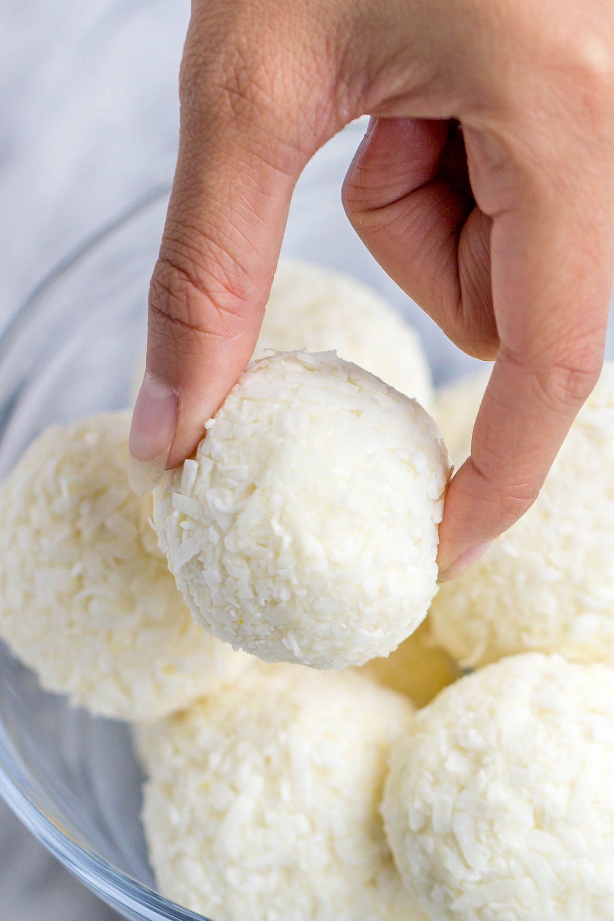 Lemon Cheesecake Keto Fat Bombs - These low-carb, keto fat-bombs are an easy, no-bake frozen treat you can make with simple ingredients. #eatwell101 #recipe #Lemon #Cheesecake #Keto #FatBombs #Lowcarb keto fat boms #low-carb, keto fat boms lemon, keto fat boms coconut oil , keto fat boms recipes, keto fat boms cream cheese, keto snacks, low carb fat bombs, low carb fat boms.