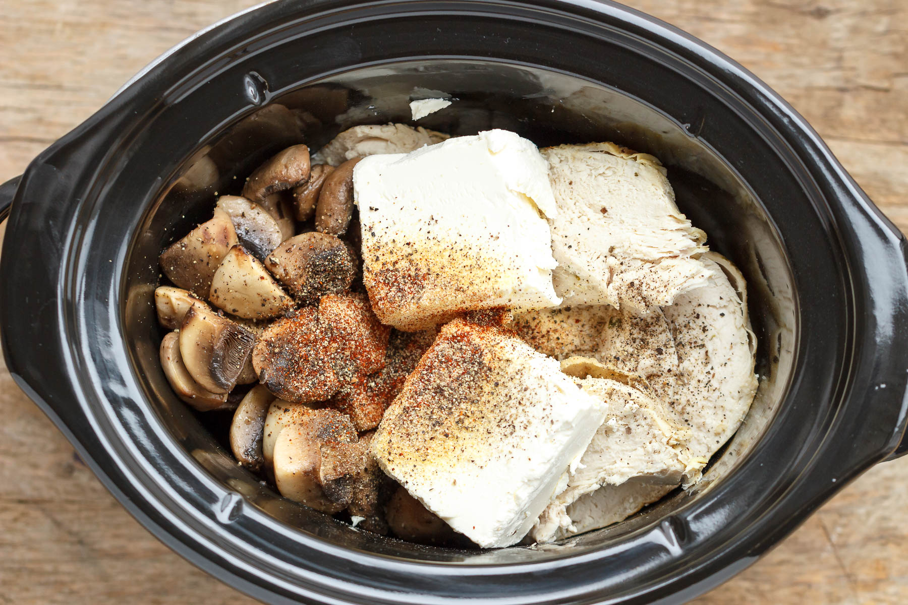 Slow Cooker Turkey Cream Cheese Soup - Rich and velvety, you'll enjoy every spoonful of this hearty turkey cream cheese soup!