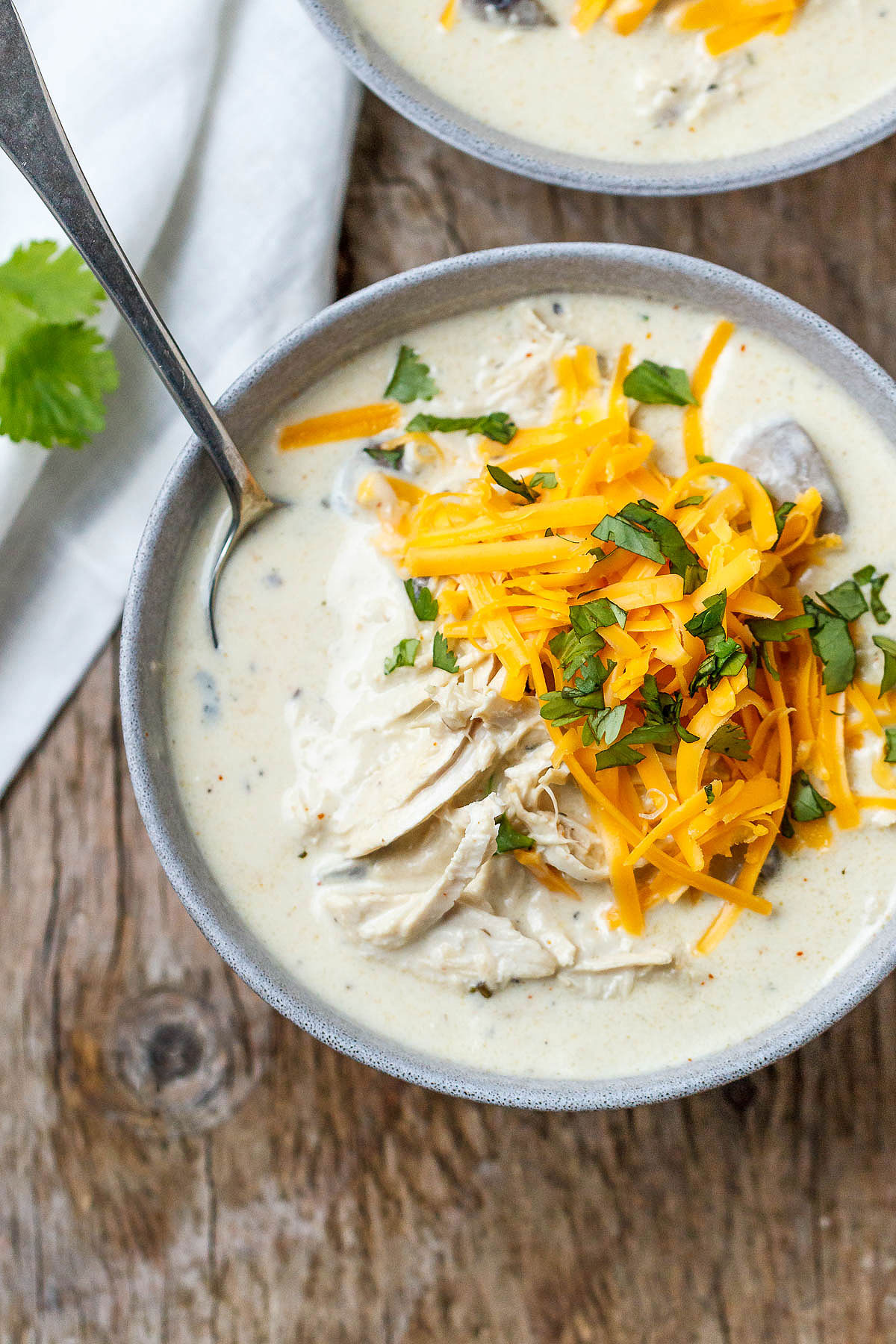 Slow Cooker Leftovers Turkey Cream Cheese Soup - Rich and velvety, you'll enjoy every spoonful of this hearty turkey cream cheese soup!