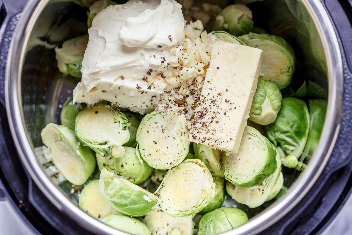 Creamy Instant Pot Brussels Sprouts - #eatwell101 #recipe #keto #lowcarb #glutenfree #vegetarian - Creamy and savory, this side dish with brussels sprouts and bacon is outstanding all on its own!