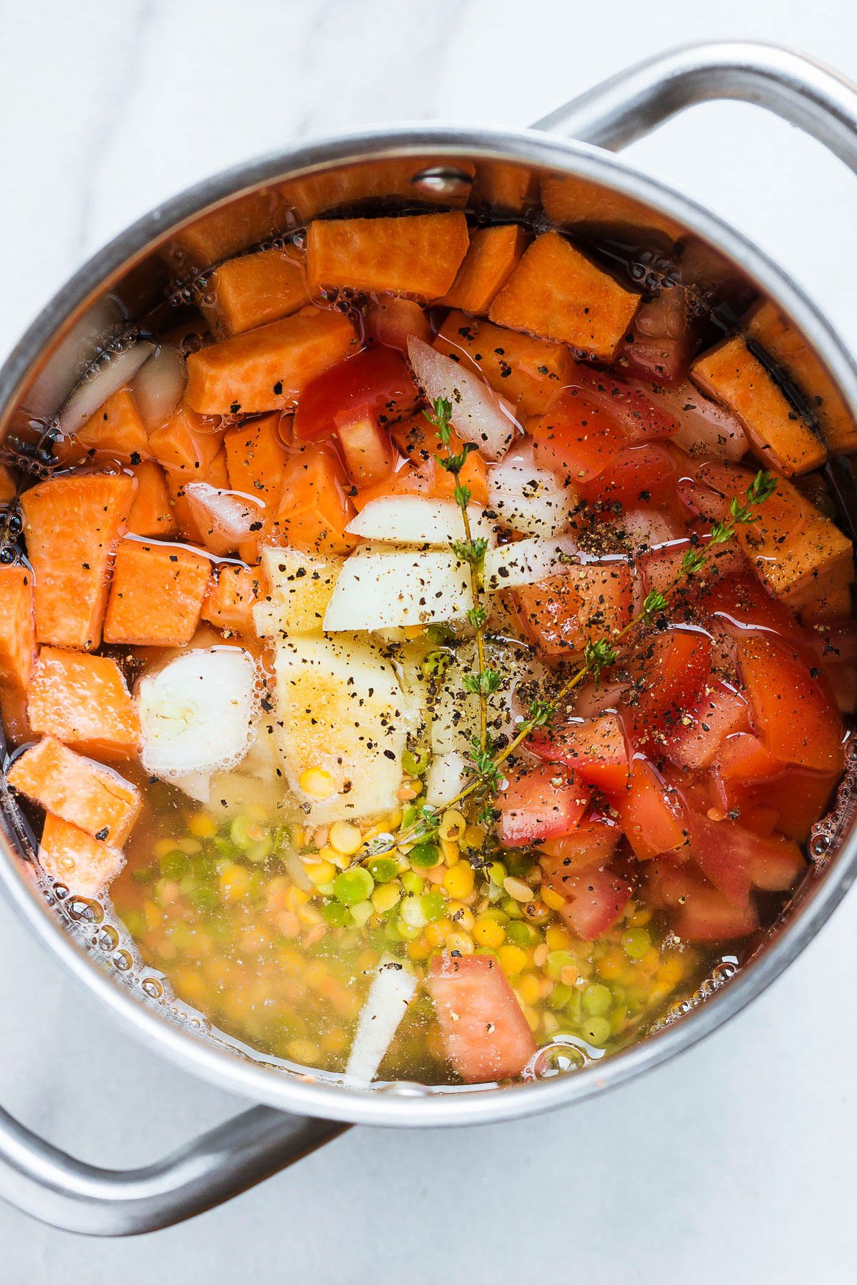 Split Pea Soup with Sweet Potato - Fiber-loaded and packed with flavor, this creamy split pea soup is a comforting vegetarian meal for chilly winter nights