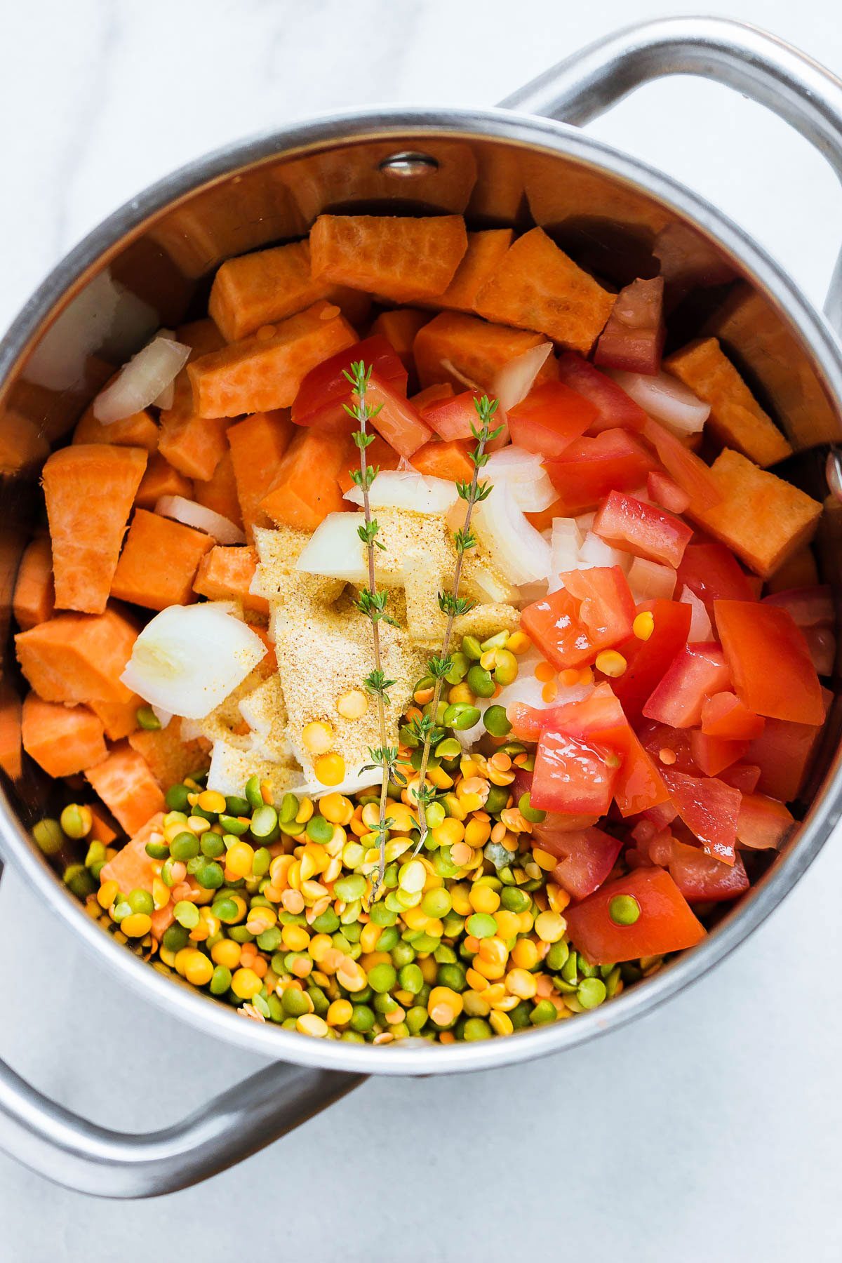Split Pea Soup with Sweet Potato - Fiber-loaded and packed with flavor, this creamy split pea soup is a comforting vegetarian meal for chilly winter nights