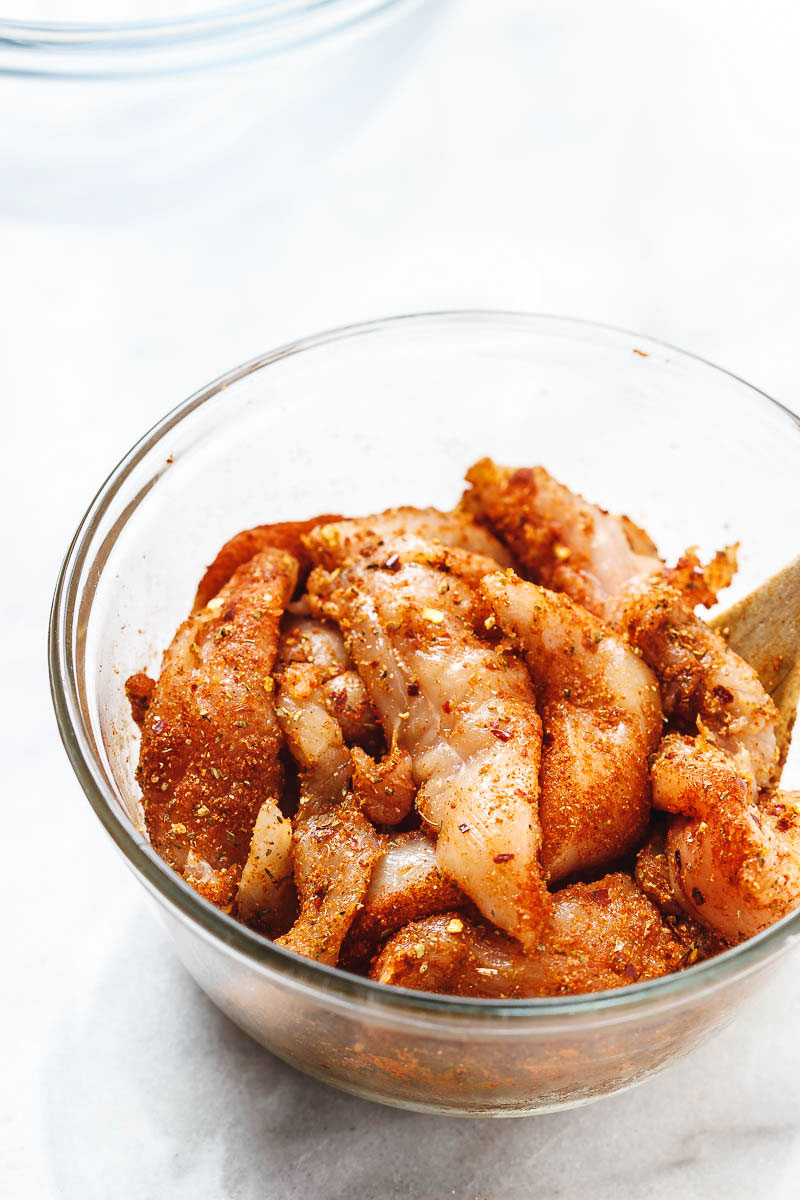 Taco Chicken Tenders with Lemon Zucchini Noodles - Incredibly flavorful and juicy Taco Chicken Bites are a perfect dinner for the busiest of weeknights.