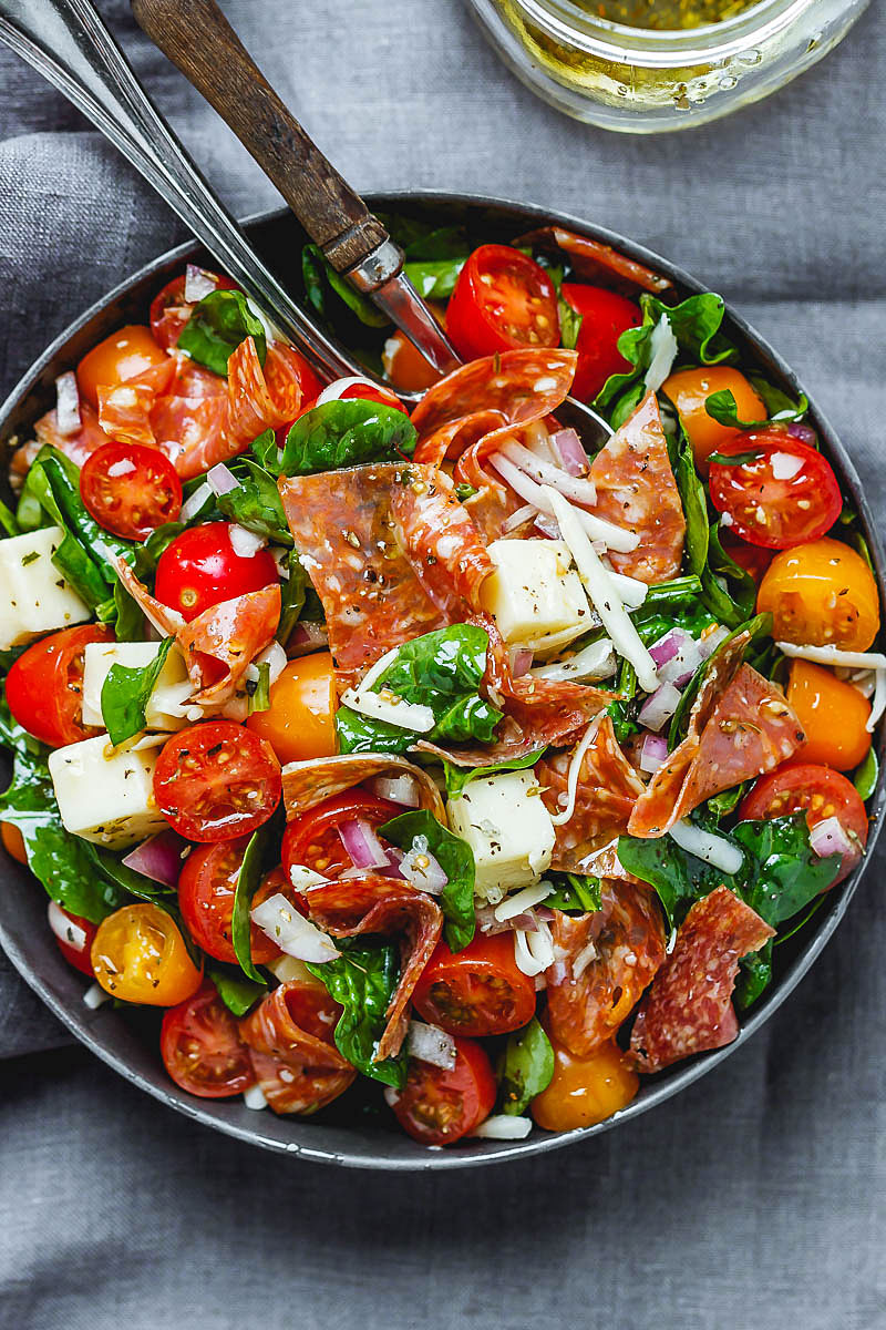 Spinach Salad with Mozzarella, Tomato & Pepperoni - Healthy and delicious, this spinach salad is so simple and perfect for a quick lunch.
