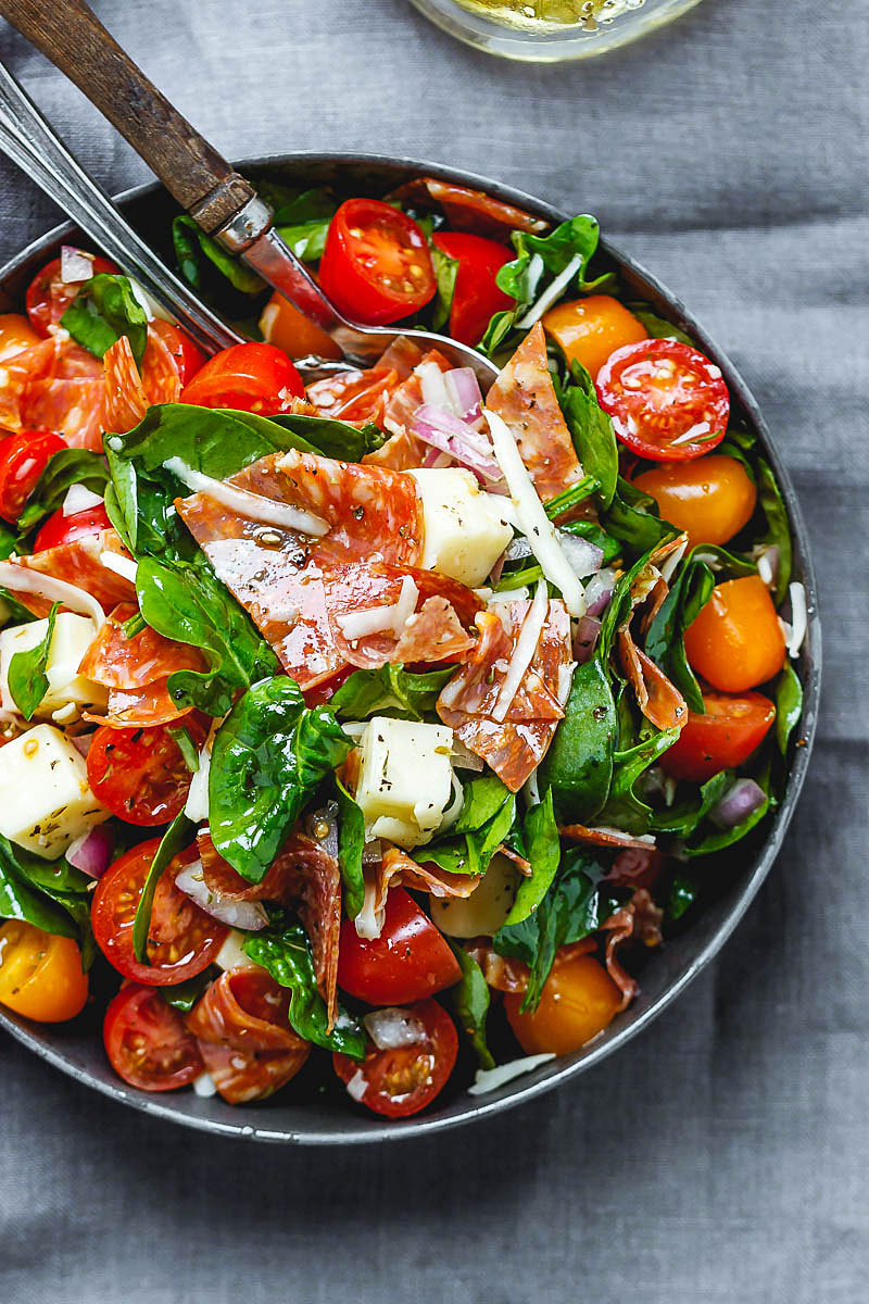 Spinach Salad with Mozzarella, Tomato & Pepperoni - Healthy and delicious, this spinach salad is so simple and perfect for a quick lunch.