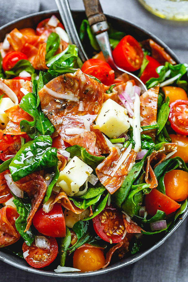Spinach Salad with Mozzarella, Tomato & Pepperoni - Healthy and delicious, this spinach salad is so simple and perfect for a quick lunch.